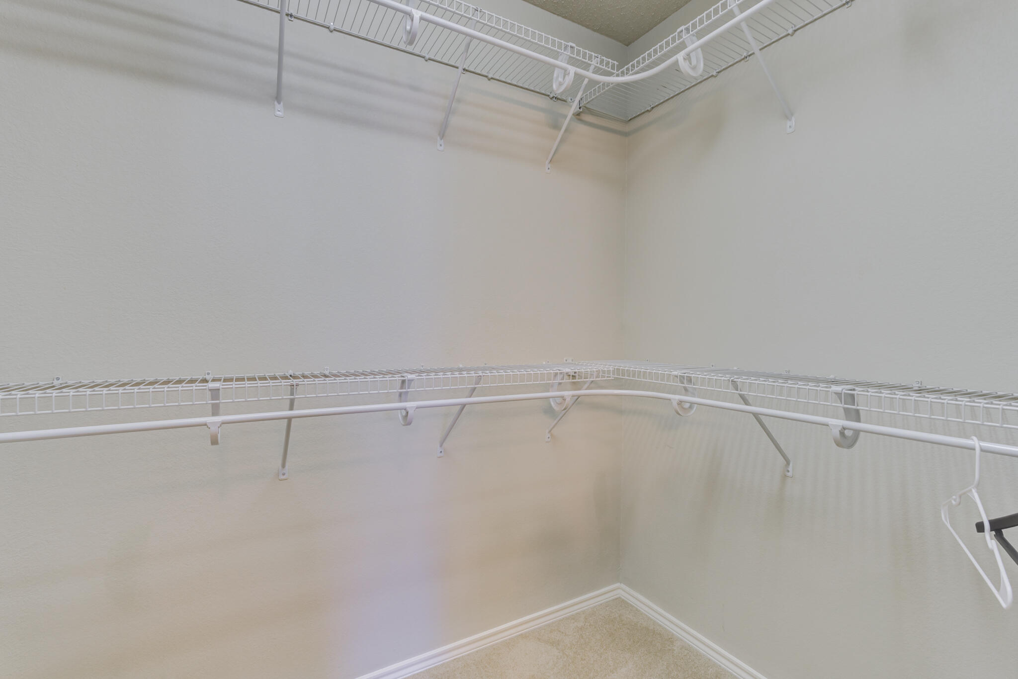 2111 Main Street, Unit 3 Lubbock, TX 79401 - Photo 36 of 49 a view of a room with racks on the wall