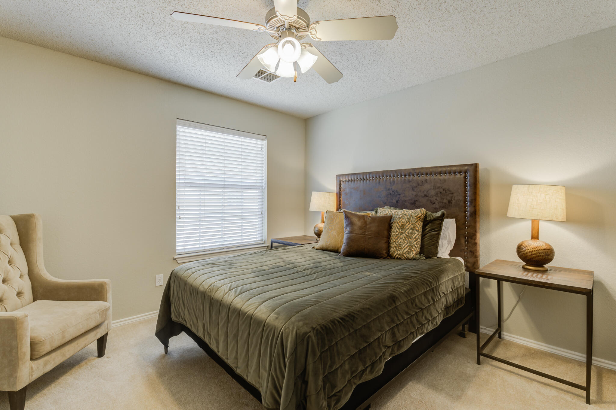 2111 Main Street, Unit 3 Lubbock, TX 79401 - Photo 39 of 49 a bedroom with a bed and window