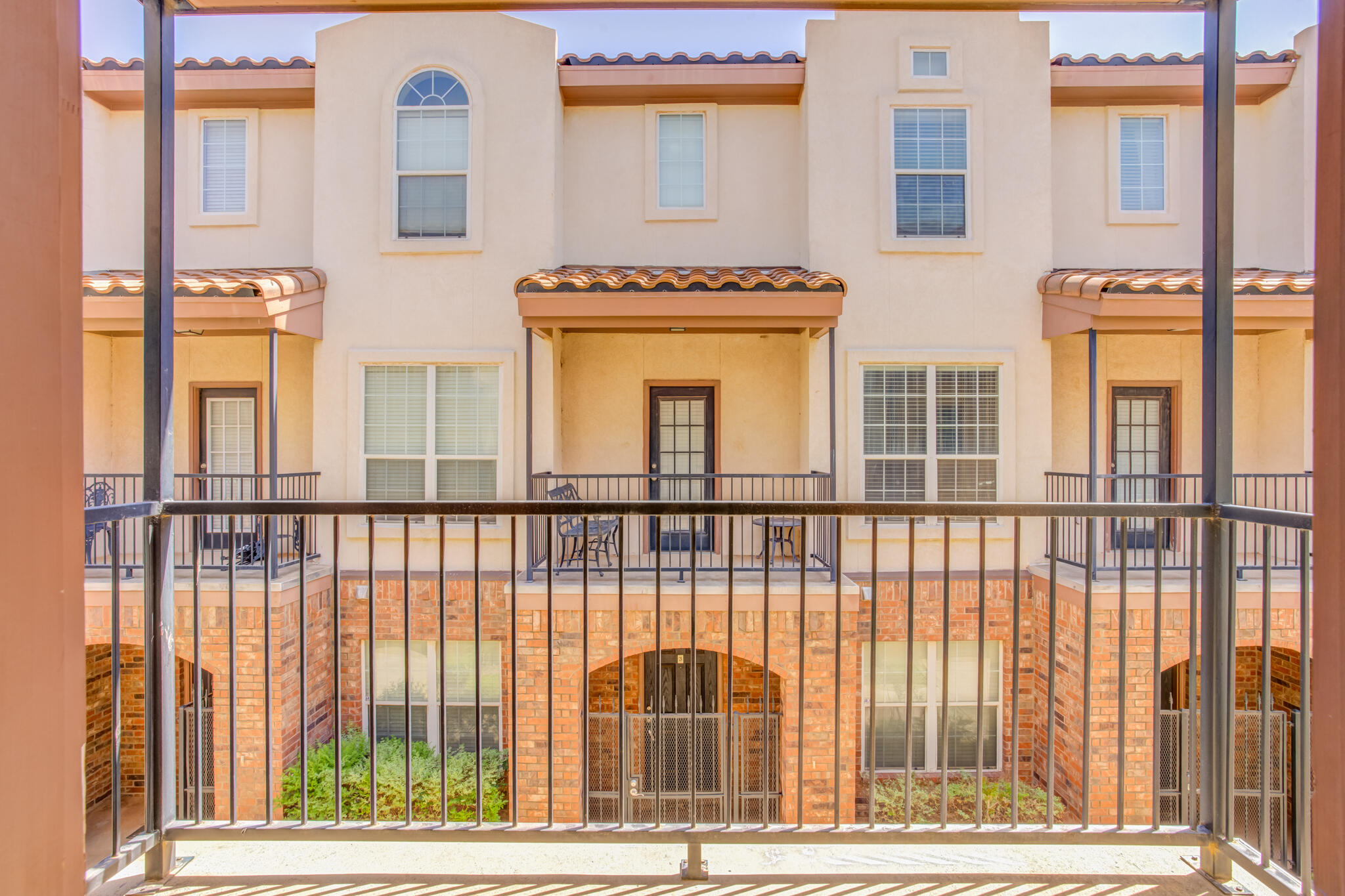 2111 Main Street, Unit 3 Lubbock, TX 79401 - Photo 43 of 49 a front view of a building with a balcony