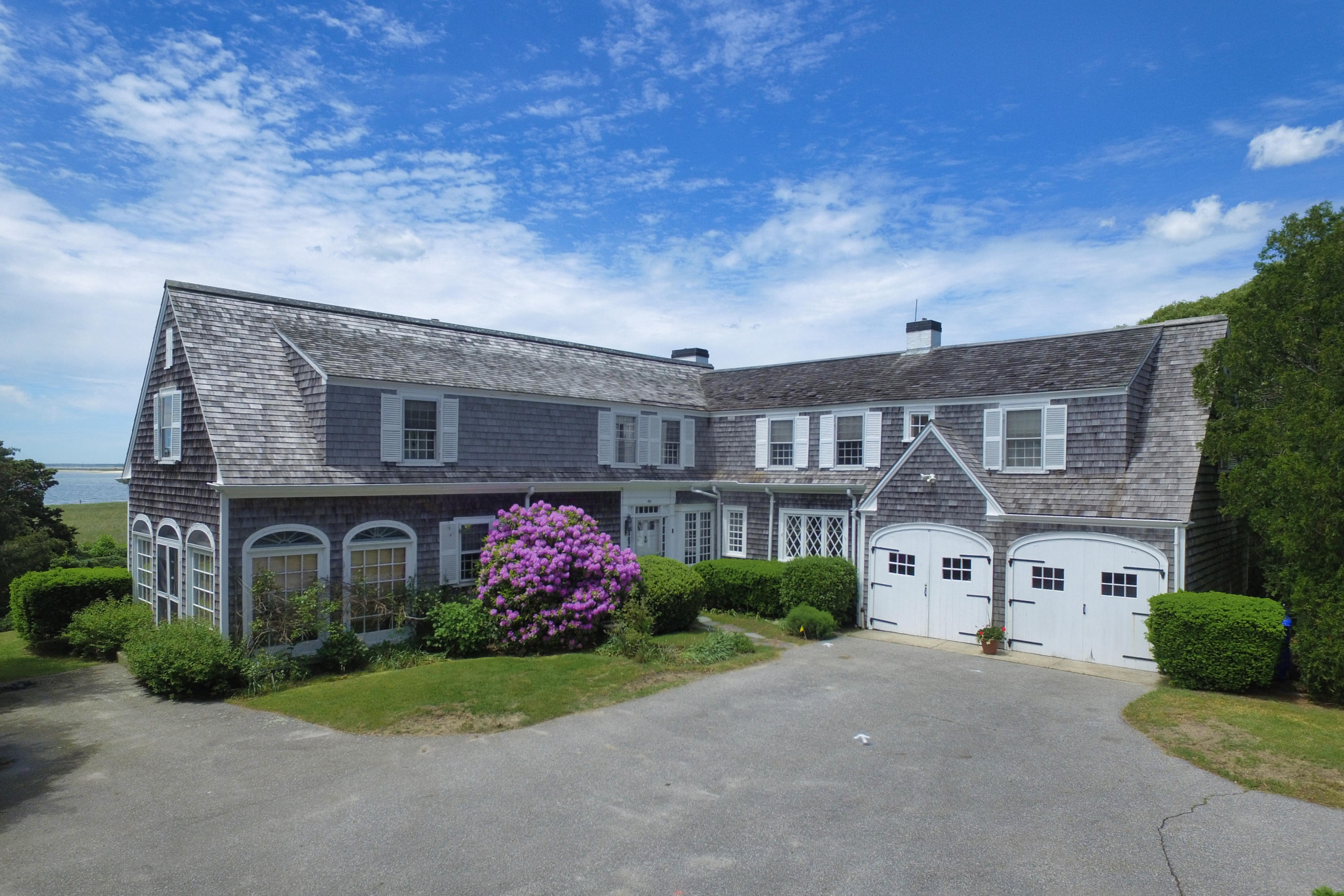 80 Rocky Point Road Bourne, MA 02532 - Photo 20 of 22 front view of house with a yard