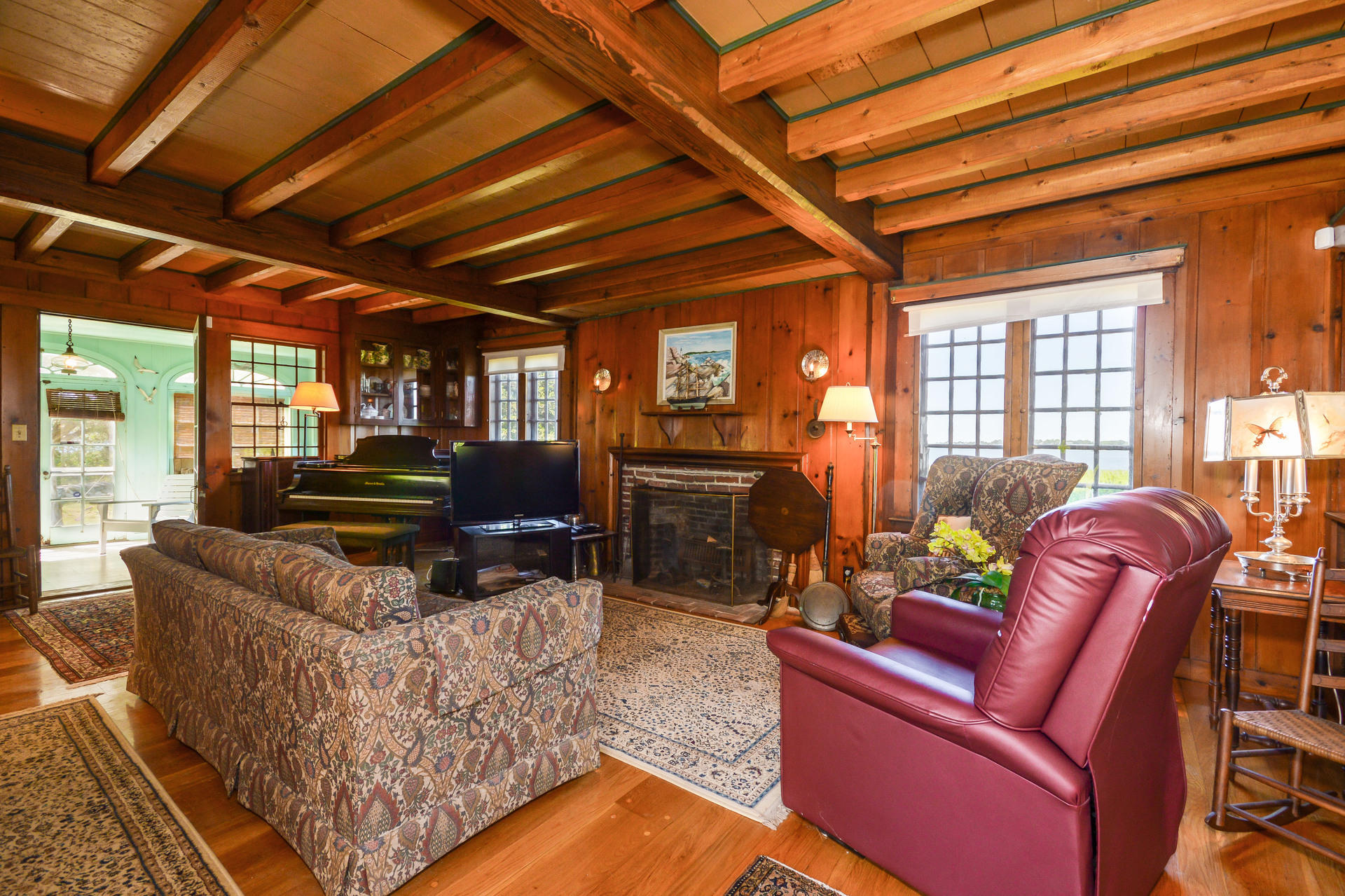 80 Rocky Point Road Bourne, MA 02532 - Photo 9 of 22 a living room with furniture and a flat screen tv