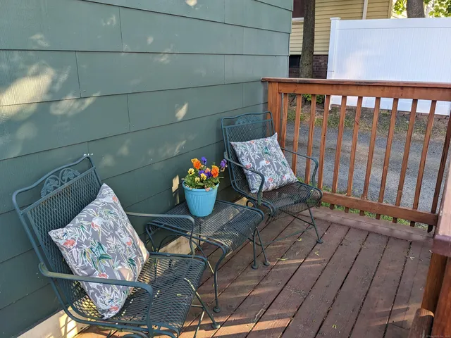 a view of a chairs and table in the outdoor