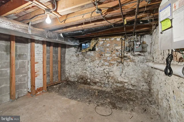 a view of an empty room with windows