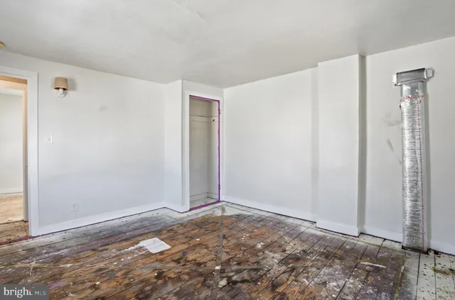 a aerial view of a house with a yard