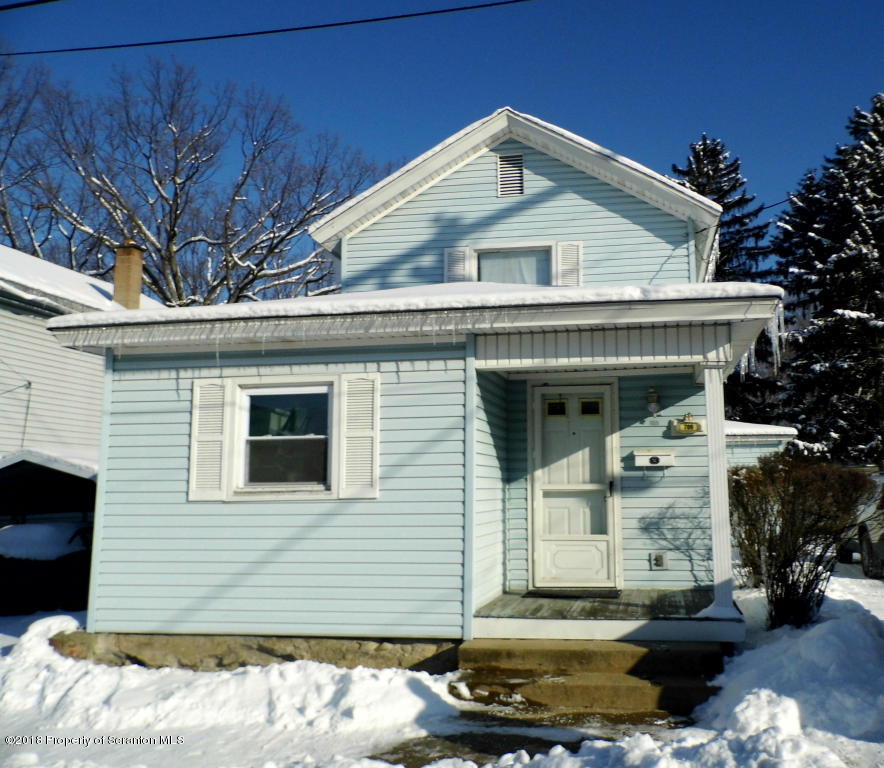 709 Spring Street Moosic, PA 18507 - Photo 1 of 11 a front view of a house