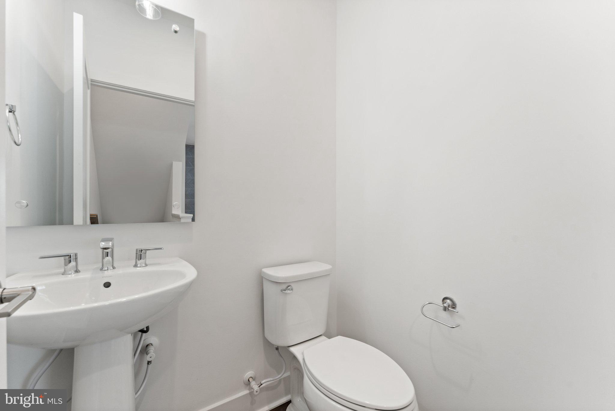 1876 Michael Faraday Drive Reston, VA 20190 - Photo 22 of 58 Main level half bath