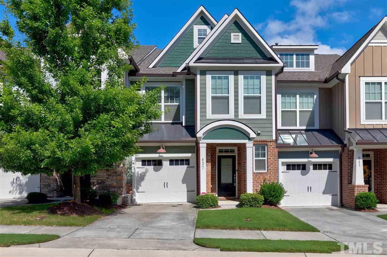 637 Fallon Grove Way Raleigh, NC 27608 - Photo 1 of 30 a front view of a house with a yard