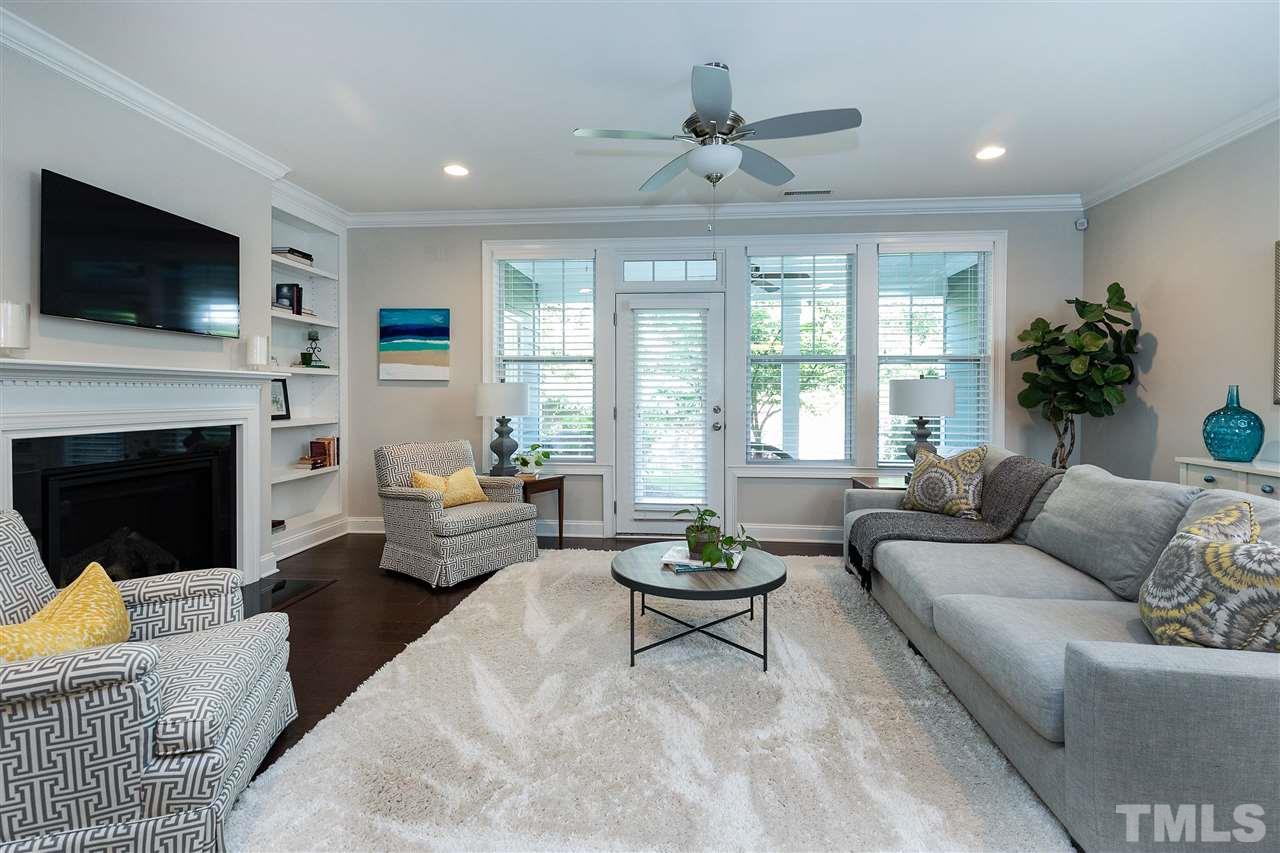 637 Fallon Grove Way Raleigh, NC 27608 - Photo 15 of 30 a living room with furniture fireplace and window