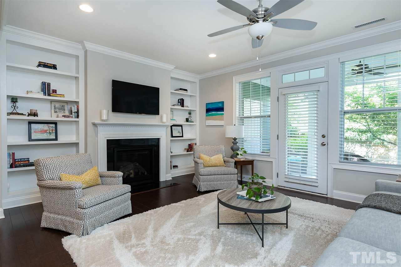 637 Fallon Grove Way Raleigh, NC 27608 - Photo 3 of 30 a living room with furniture fireplace and window