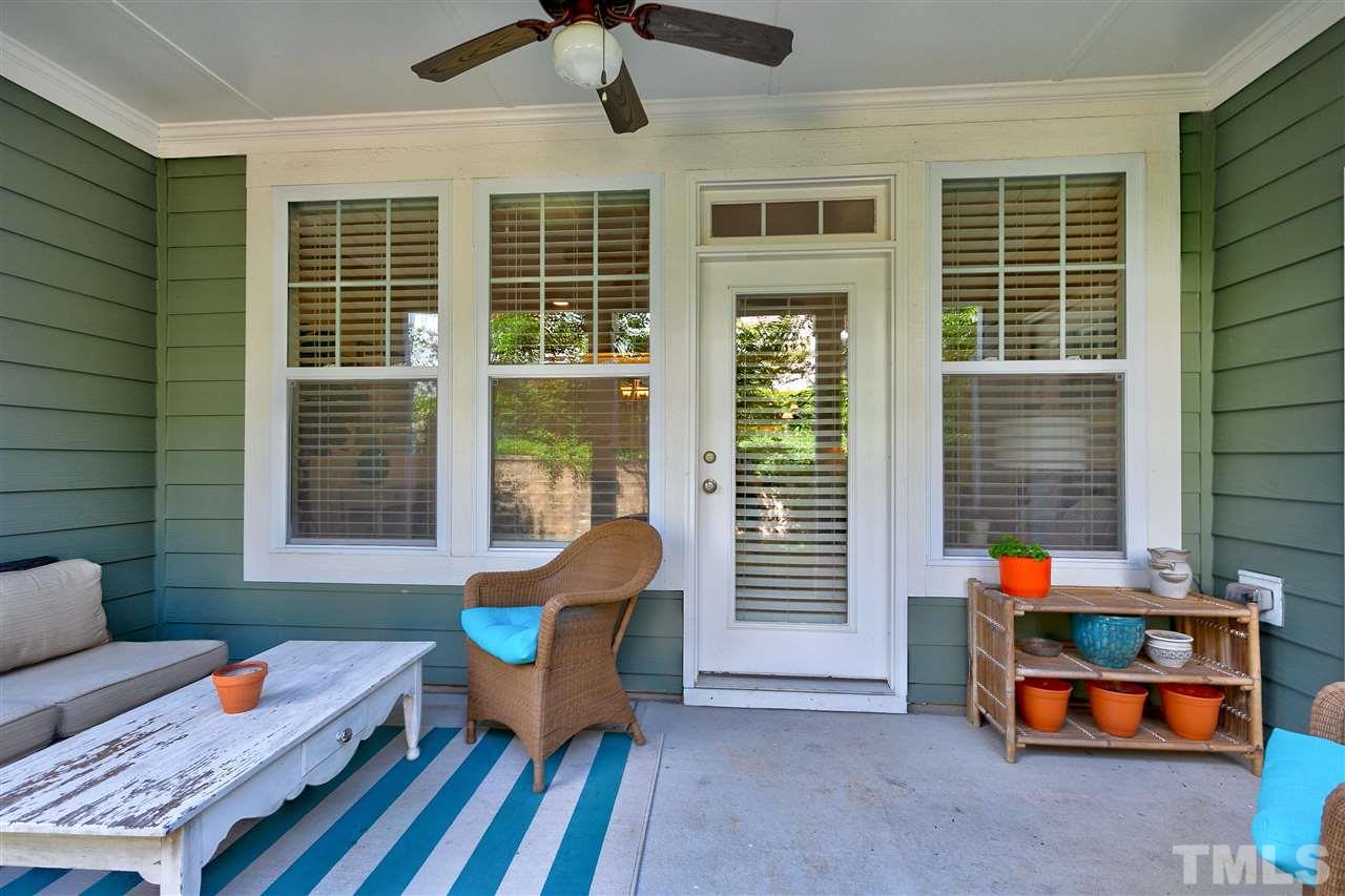 637 Fallon Grove Way Raleigh, NC 27608 - Photo 28 of 30 a backyard of a house with outdoor seating