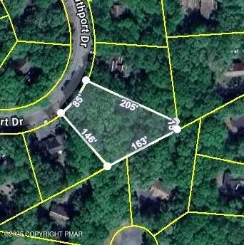 a view of a hallway with washer and dryer