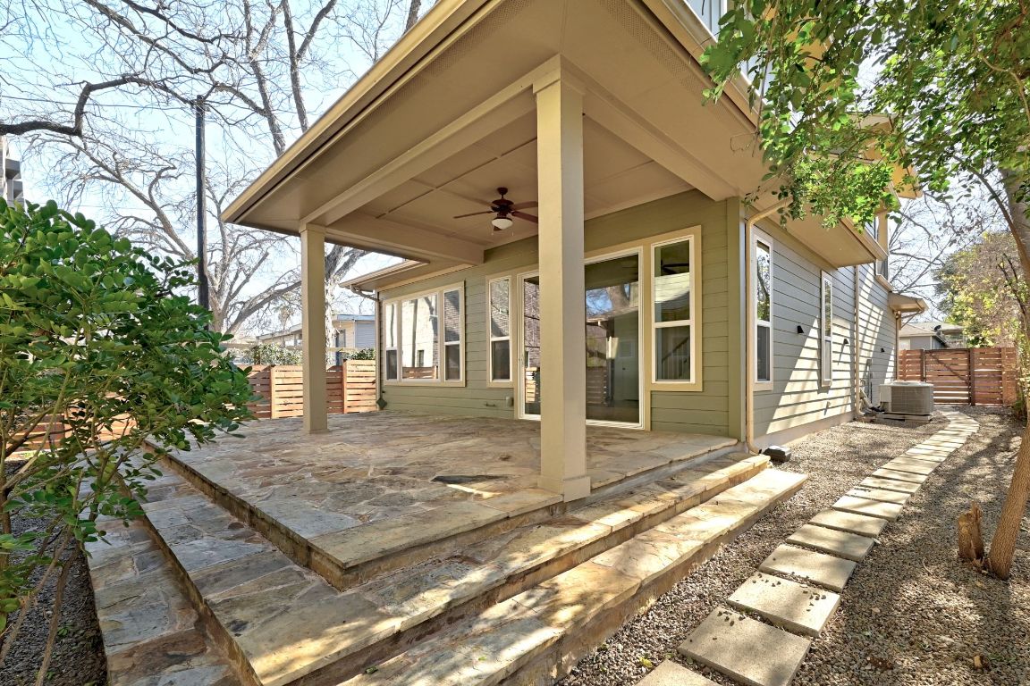 1912 Haskell Street, Unit 1 Austin, TX 78702 - Photo 19 of 23 Fenced backyard with ceiling fan and a patio