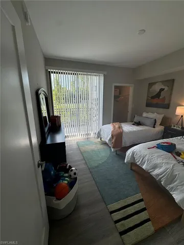 a living room with furniture and a gate