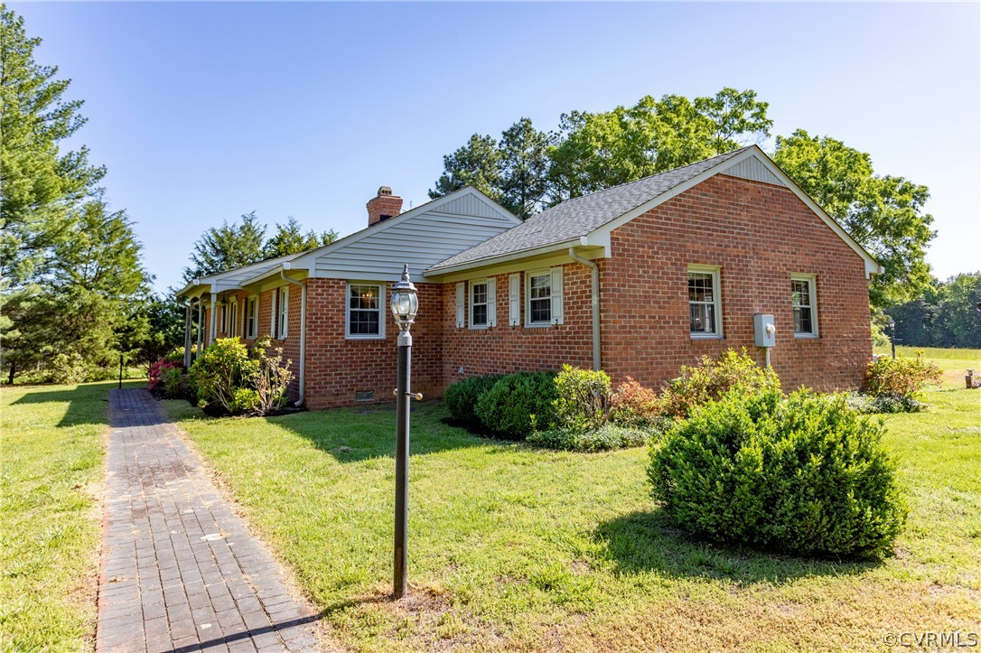 2619 Manakin Road Manakin-Sabot, VA 23103 - Photo 3 of 32 a front view of a house with a yard