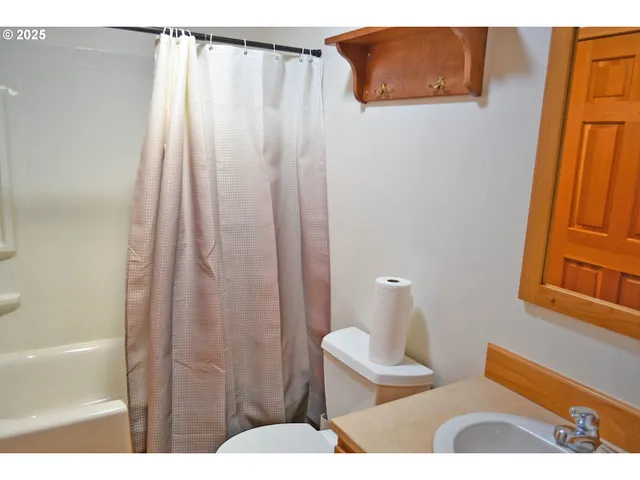 a view of a room with rack on the wall