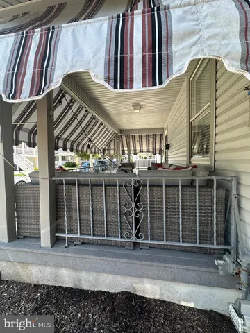 a kitchen with a sink and wooden cabinets