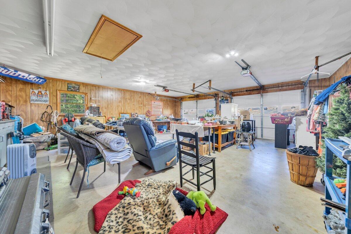 3226 Rakes Road Rocky Mount, VA 24151 - Photo 55 of 74 a living room with lots of furniture and clutter