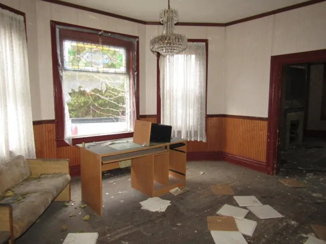 a living room with furniture and a window