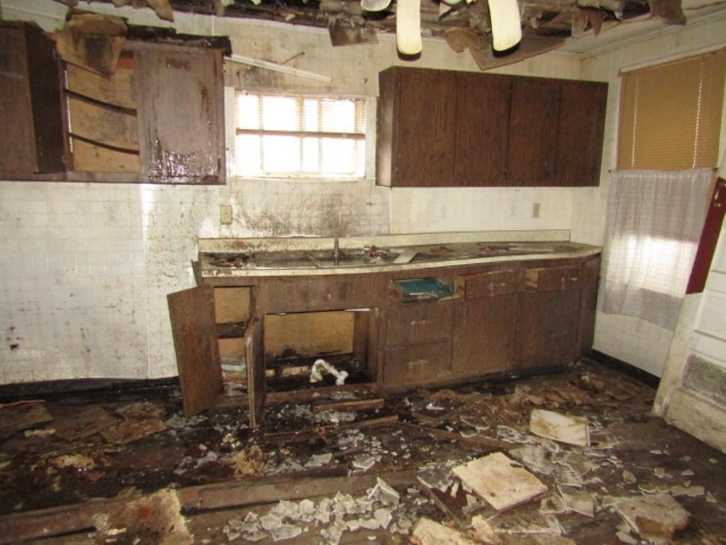 500 East 2nd Avenue Tarentum, PA 15084 - Photo 12 of 30 a room with water heater and wooden cabinets