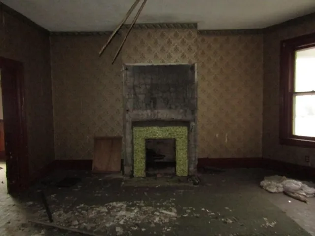 a living room with a fireplace