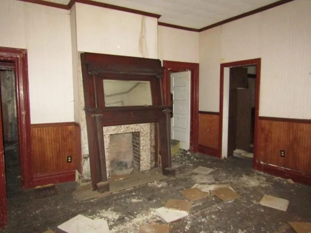 a view of an entryway with a fireplace