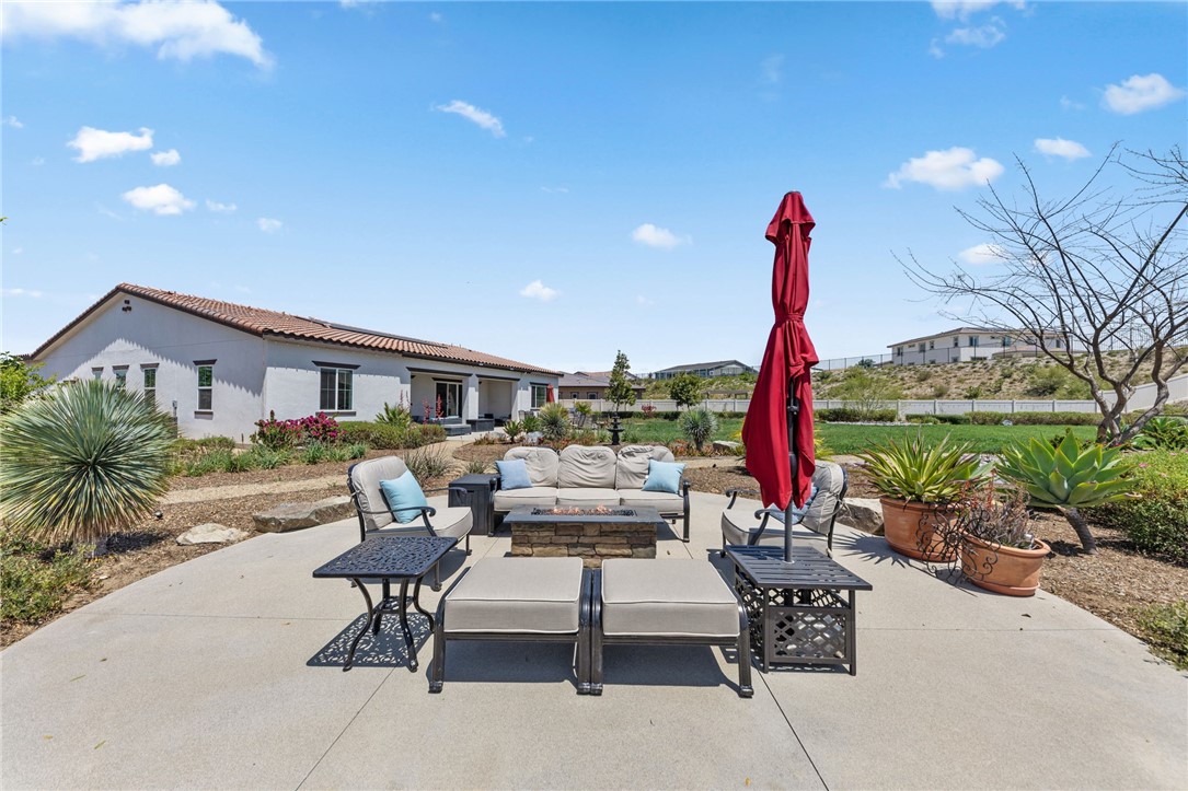 7631 Capstone Court Riverside, CA 92506 - Photo 31 of 39 Outdoor entertaining area surrounded by attractive landscaping.