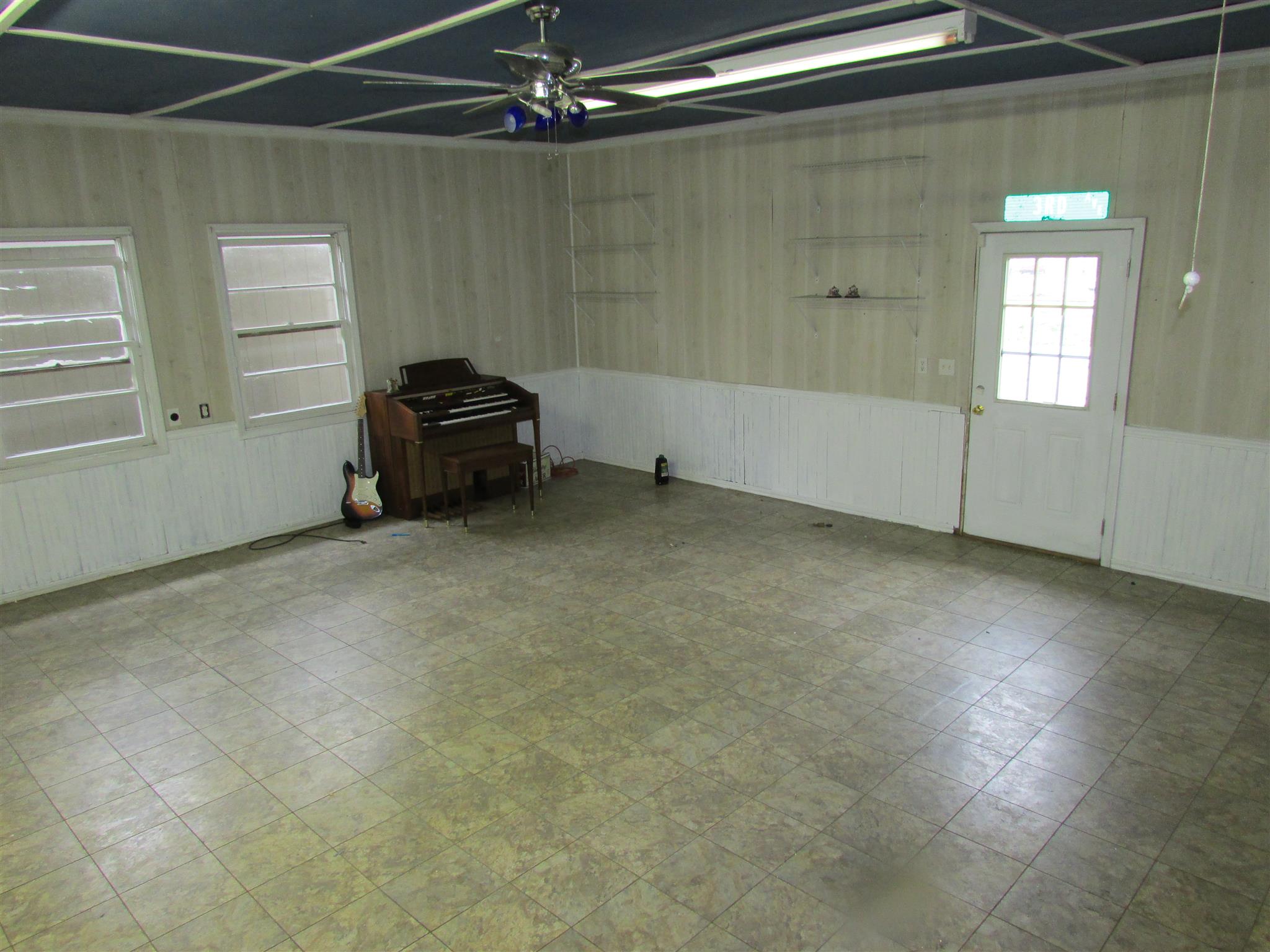 1704 3rd Avenue Manchester, TN 37355 - Photo 16 of 19 a view of a livingroom with an empty space and a window