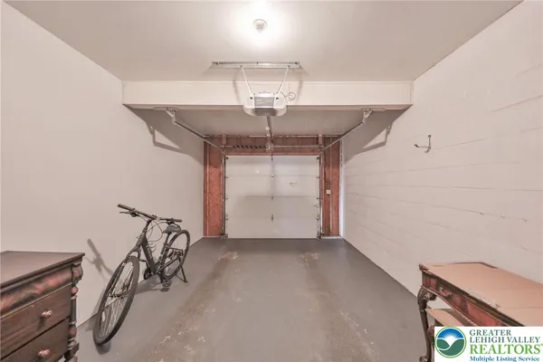 a bedroom with bed and a window