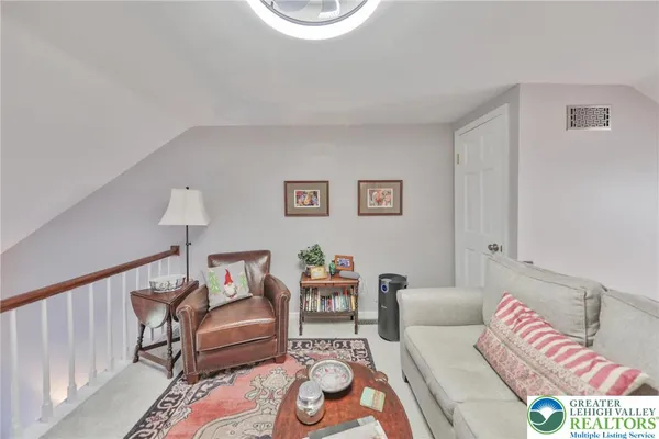 a bedroom with a bed and furniture