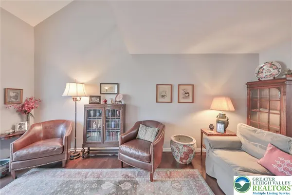 a living room with furniture and a couch
