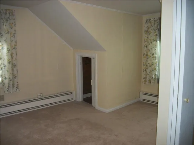 an empty room with window