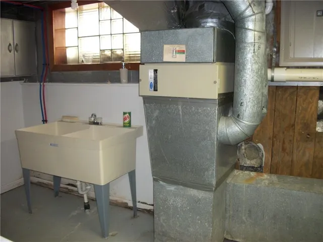 a room that has a closet and a flat screen tv