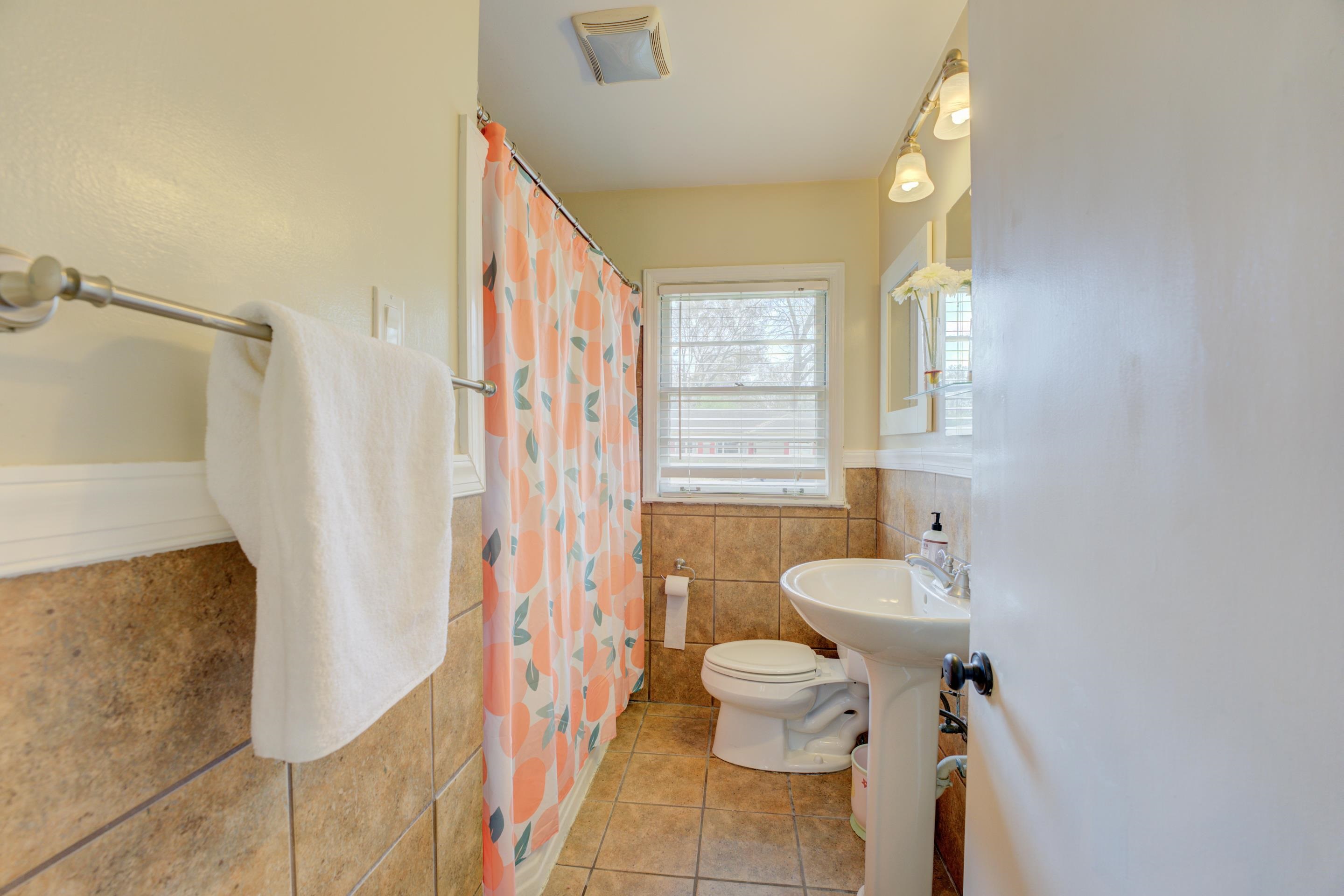 4682 Kaye Road Memphis, TN 38117 - Photo 8 of 17 a bathroom with a sink toilet and shower