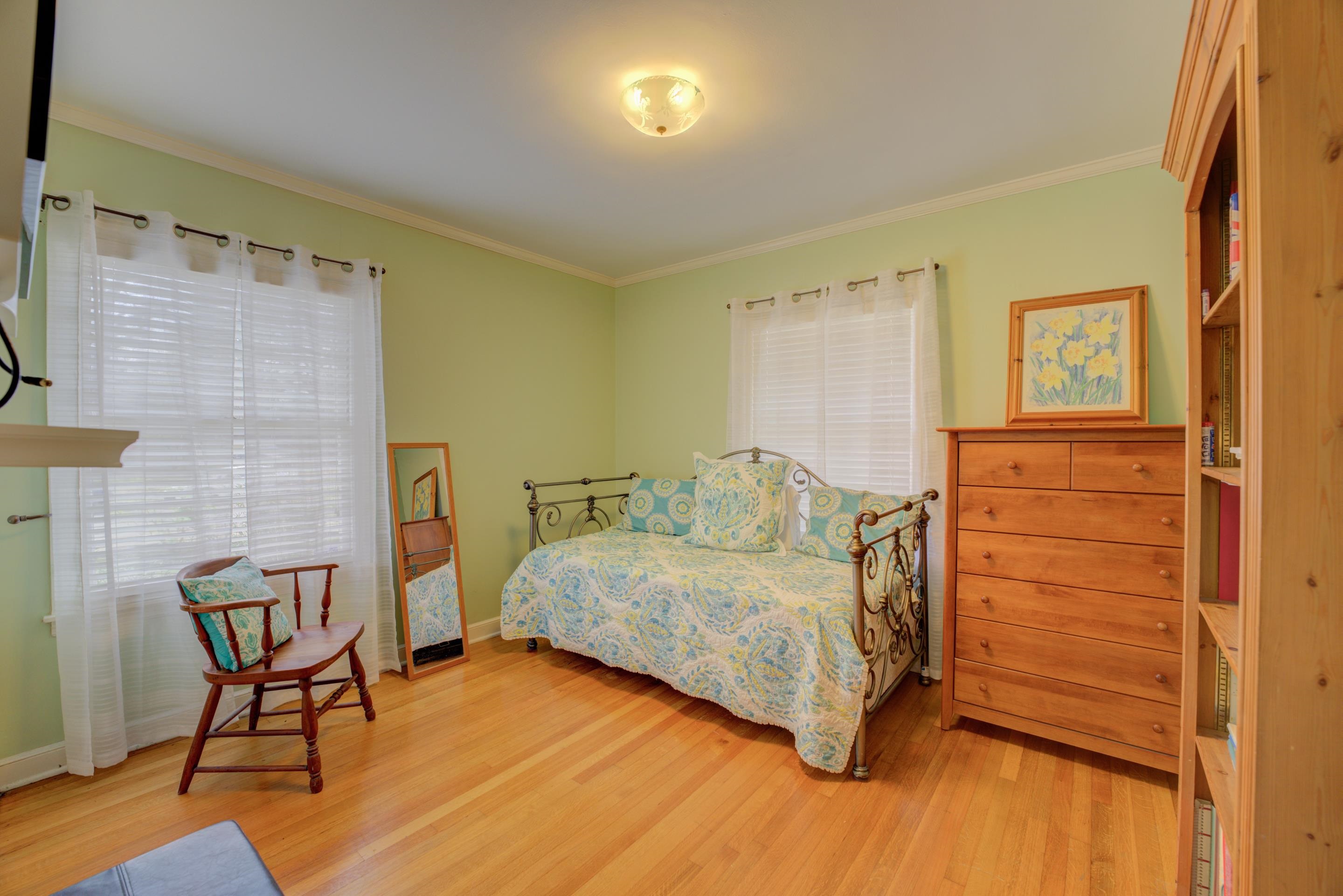 4682 Kaye Road Memphis, TN 38117 - Photo 9 of 17 a bedroom with a bed chair and dresser