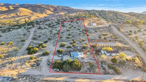 a view of ocean and mountain