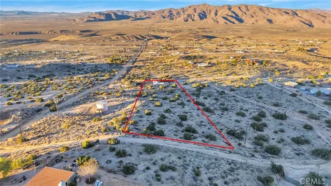 a view of an outdoor space with mountain view