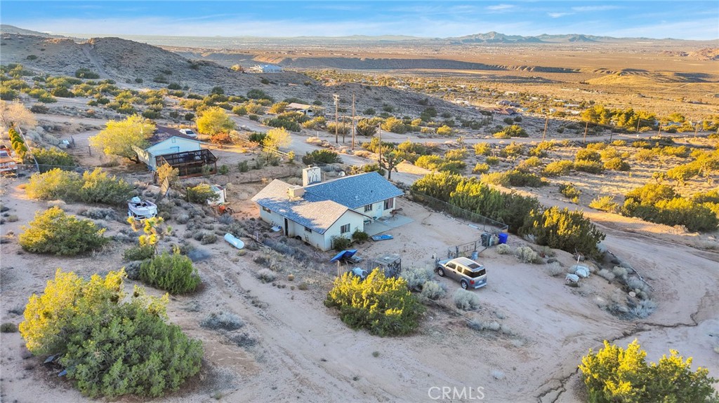 25735 Santa Rosa Road Apple Valley, CA 92308 - Photo 31 of 33 an aerial view of residential houses with outdoor space