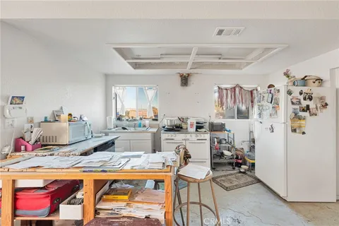 a very nice looking dining room with a table and chairs