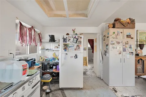 a view of storage utility and utility room