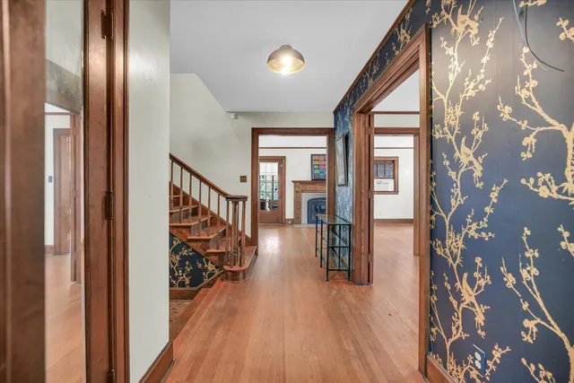 a view of gallery with wooden floor