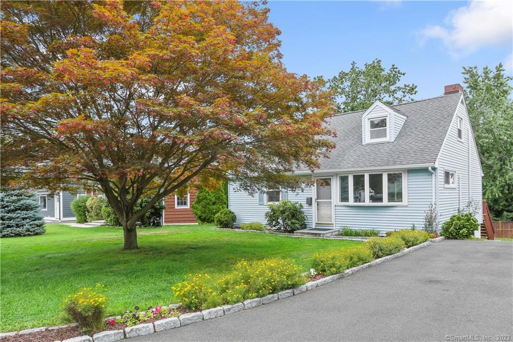 front view of house with a yard