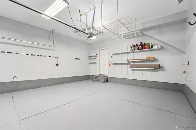 a view of a patio with a chairs and table in a patio