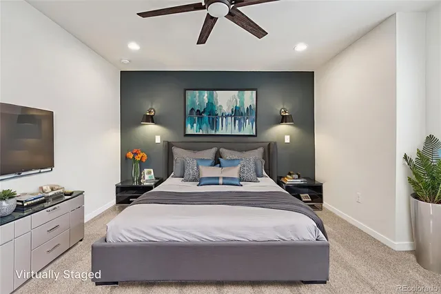 a view of kitchen with stainless steel appliances wooden floor and a large window