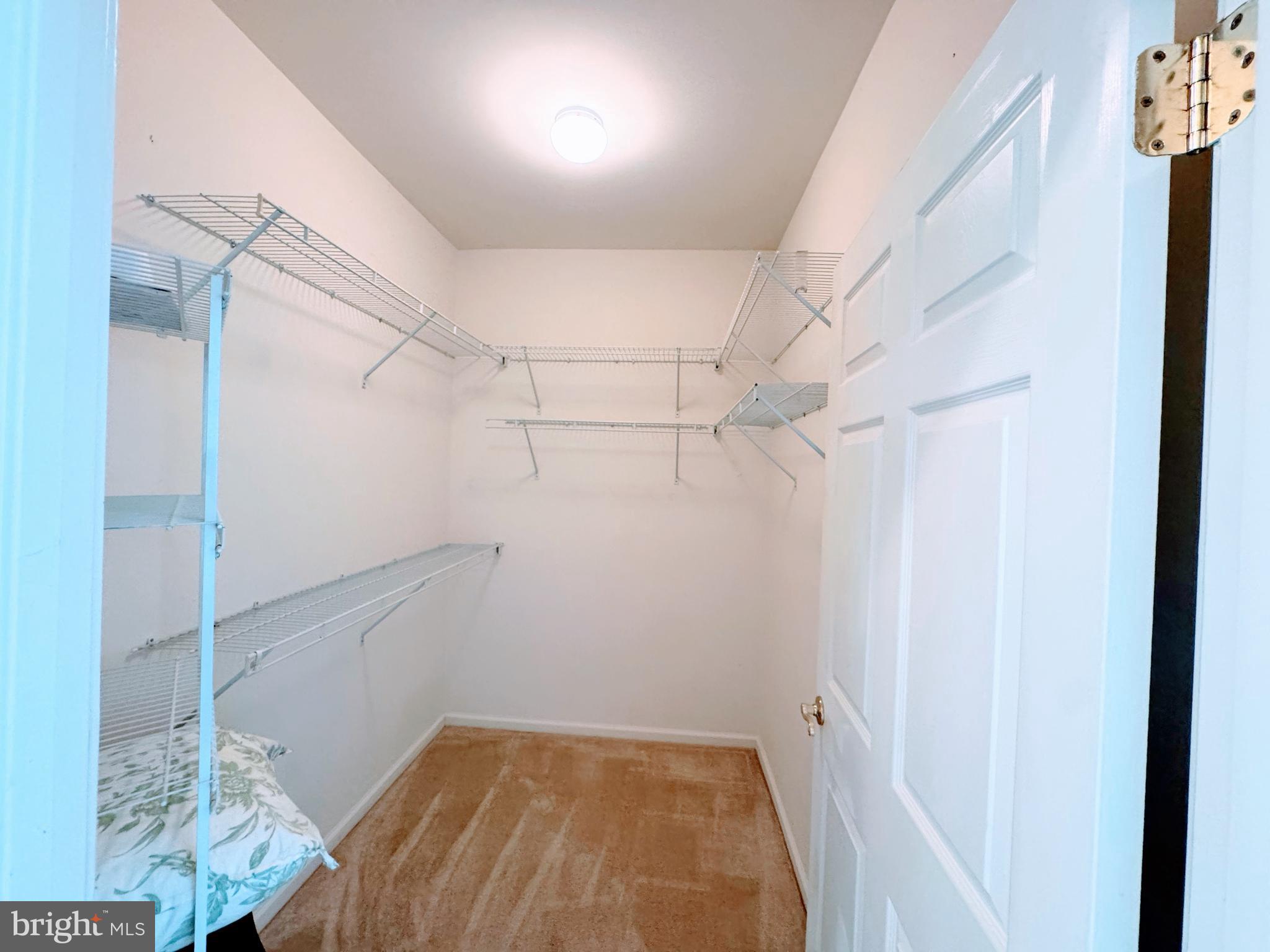 622 Masterson Court Ewing, NJ 08618 - Photo 13 of 26 a view of a room with racks on the wall