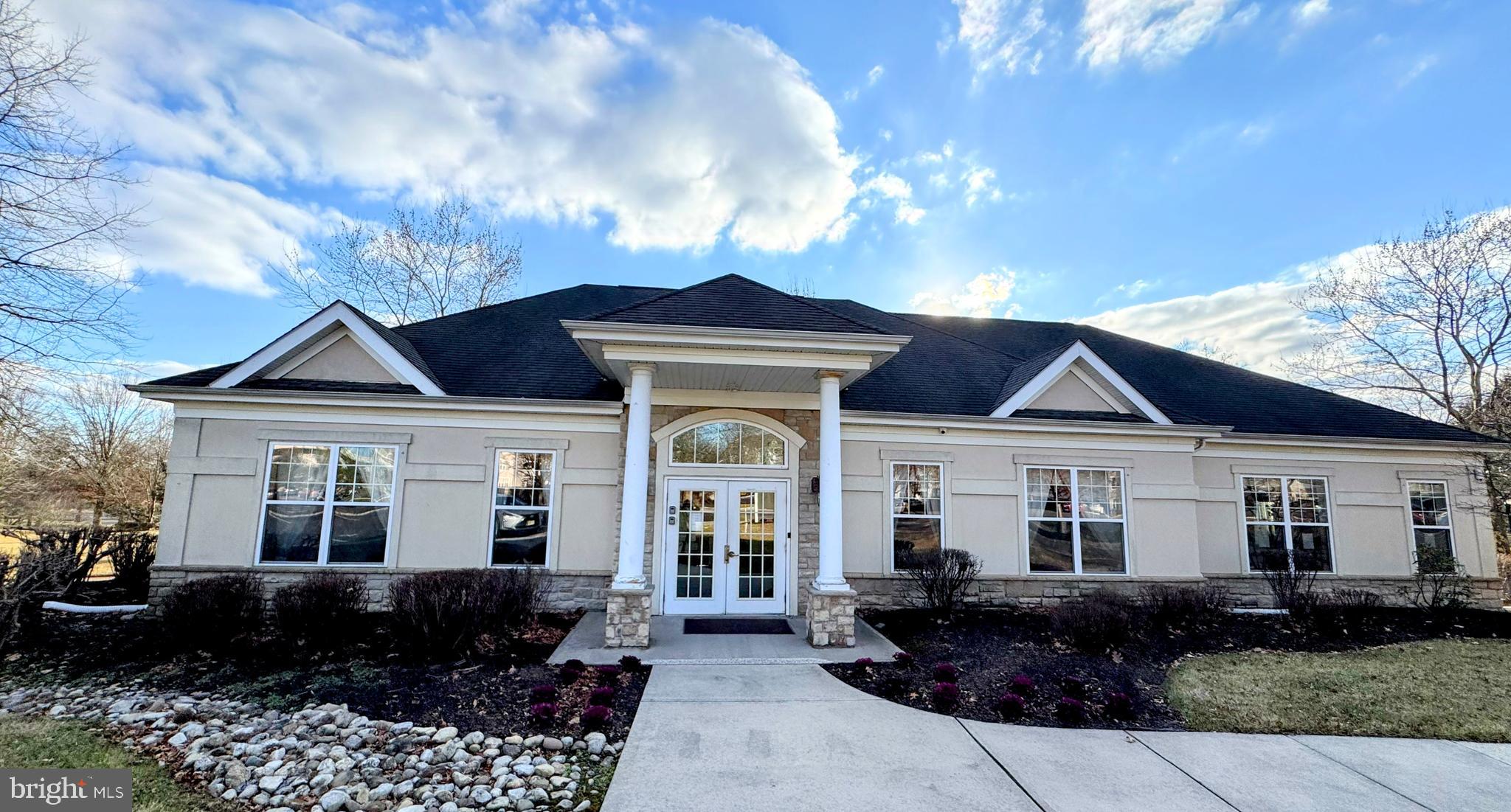622 Masterson Court Ewing, NJ 08618 - Photo 25 of 26 a front view of a house with garden
