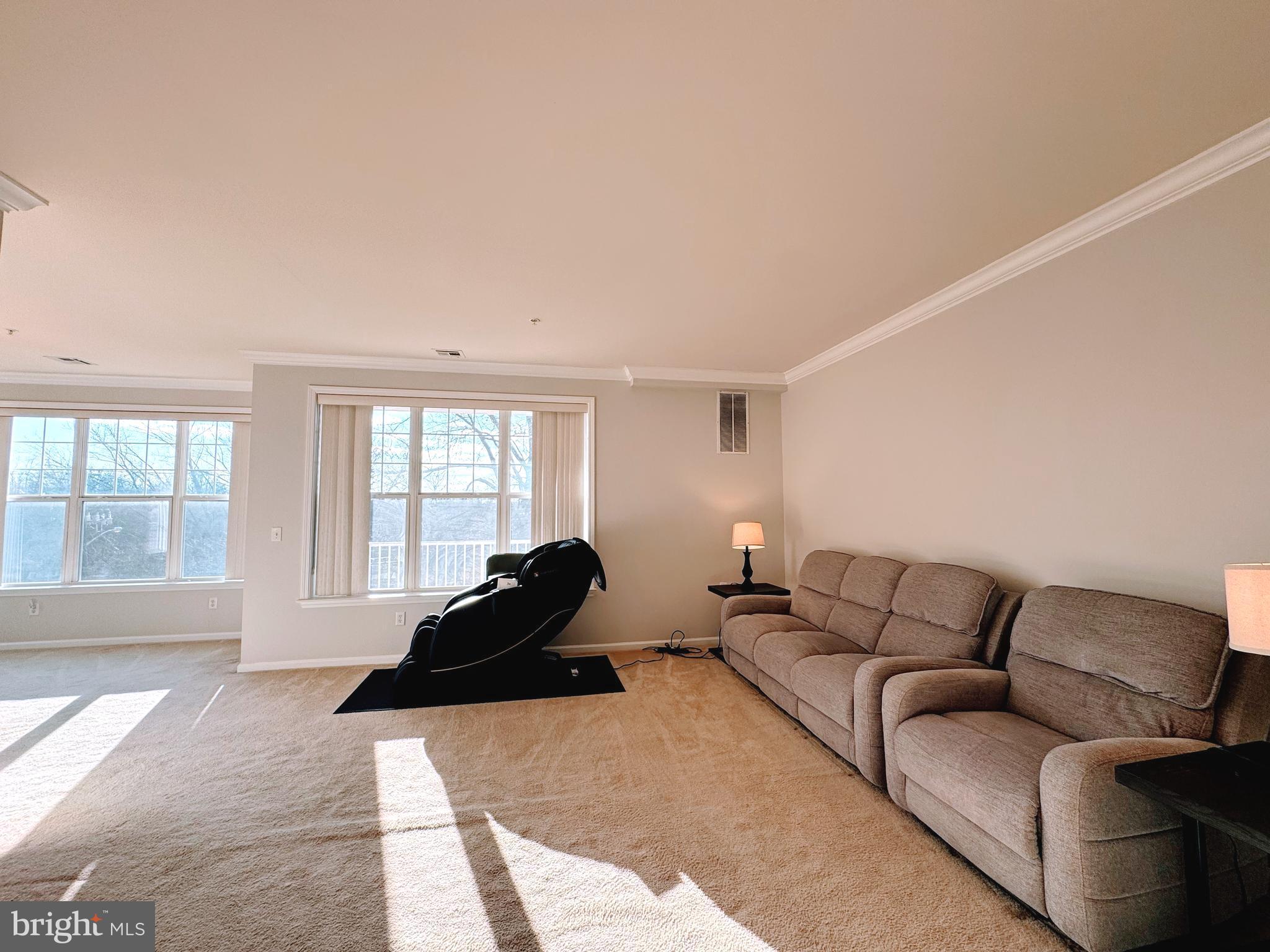 622 Masterson Court Ewing, NJ 08618 - Photo 6 of 26 a living room with furniture and a large window