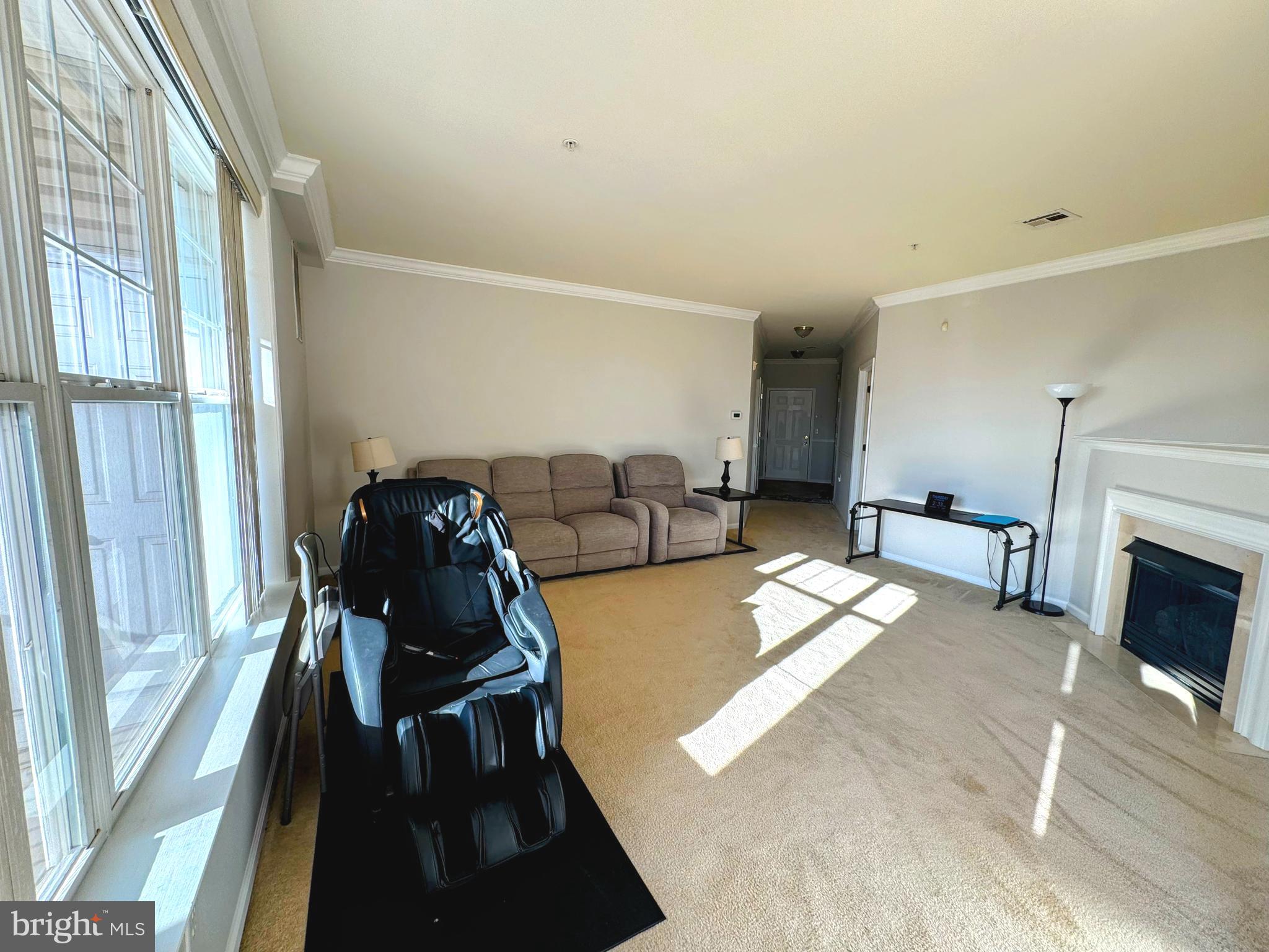 622 Masterson Court Ewing, NJ 08618 - Photo 7 of 26 a living room with furniture and a fireplace
