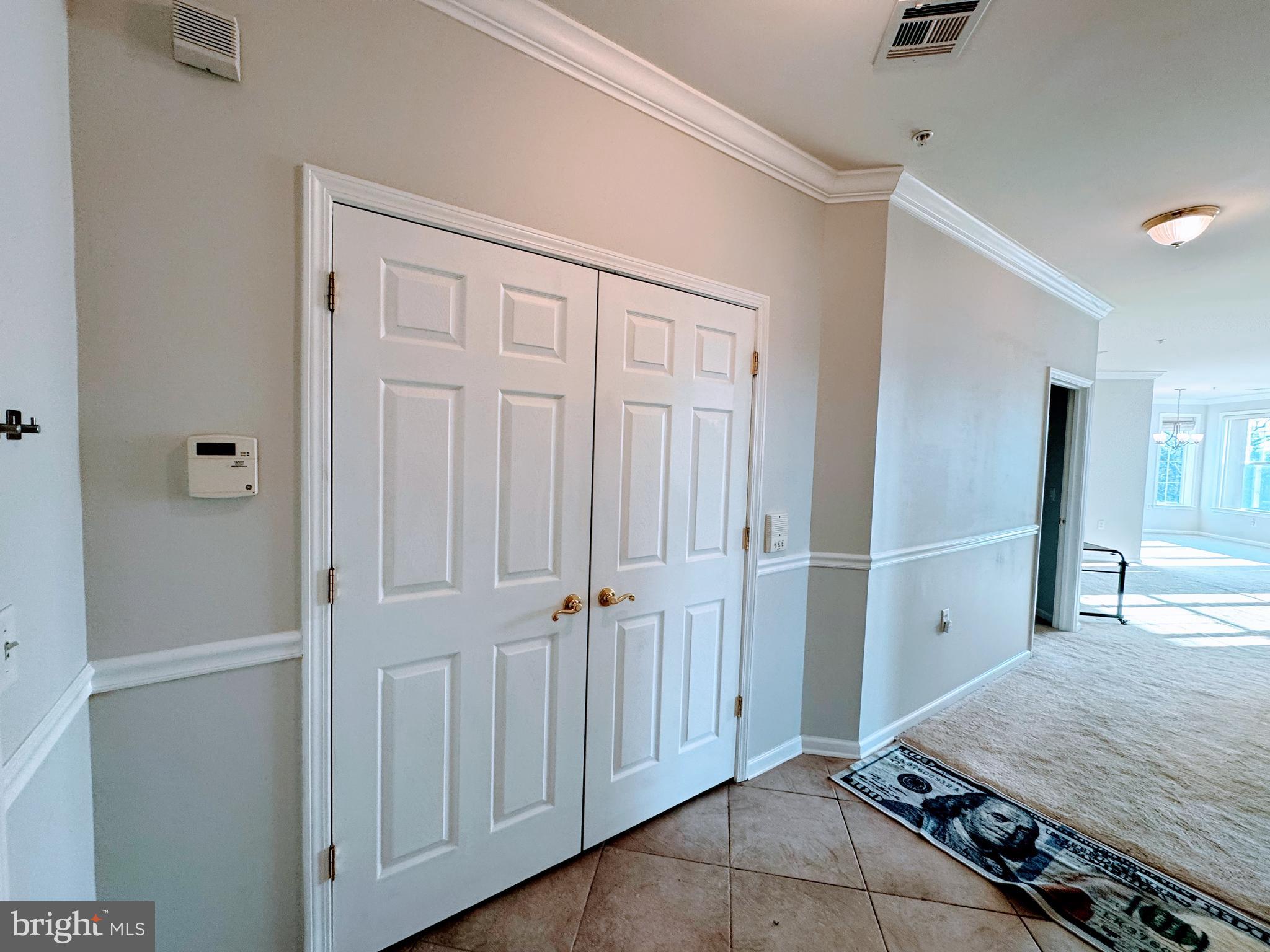 622 Masterson Court Ewing, NJ 08618 - Photo 8 of 26 a view of a hallway with wooden floor and entryway