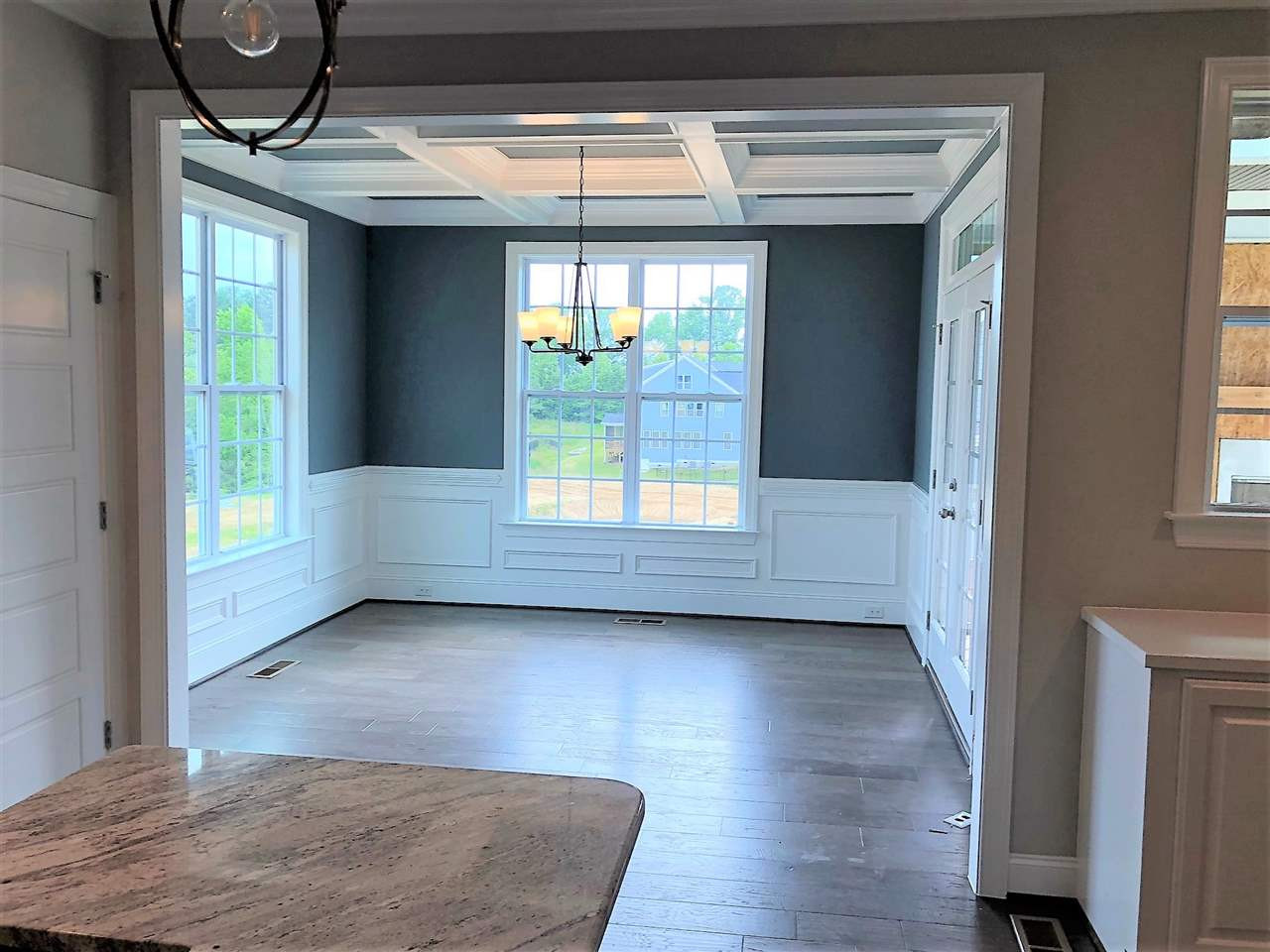 1500 Baxter Ridge Court Apex, NC 27502 - Photo 16 of 25 kitchen thru to the family and dining rooms kitchen to dining