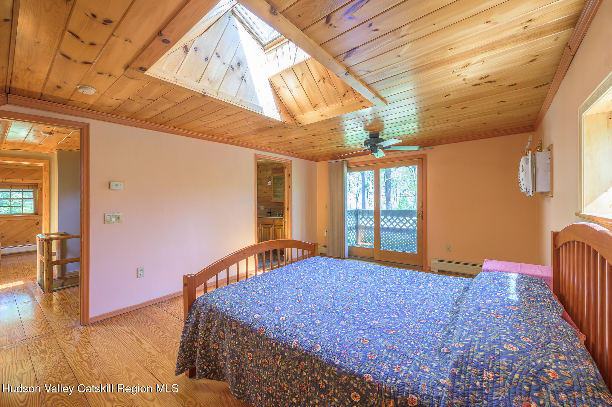 34 Queechy Shore Beach Road Canaan, NY 12029 - Photo 18 of 31 a bedroom with a bed and wooden floor